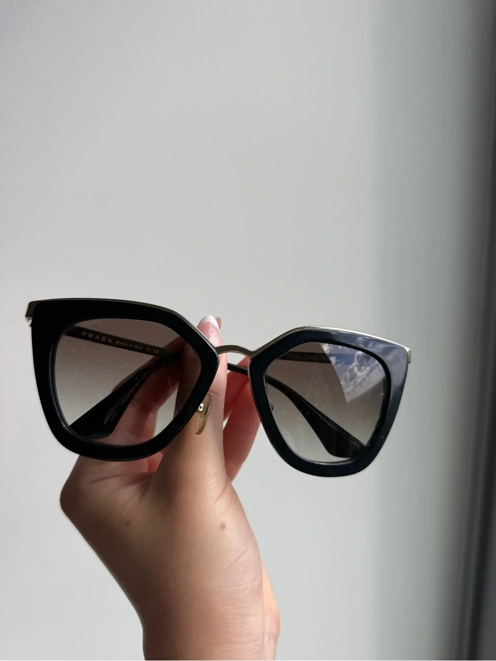 Prada Black Cat-Eye Sunglasses with Gradient Lenses